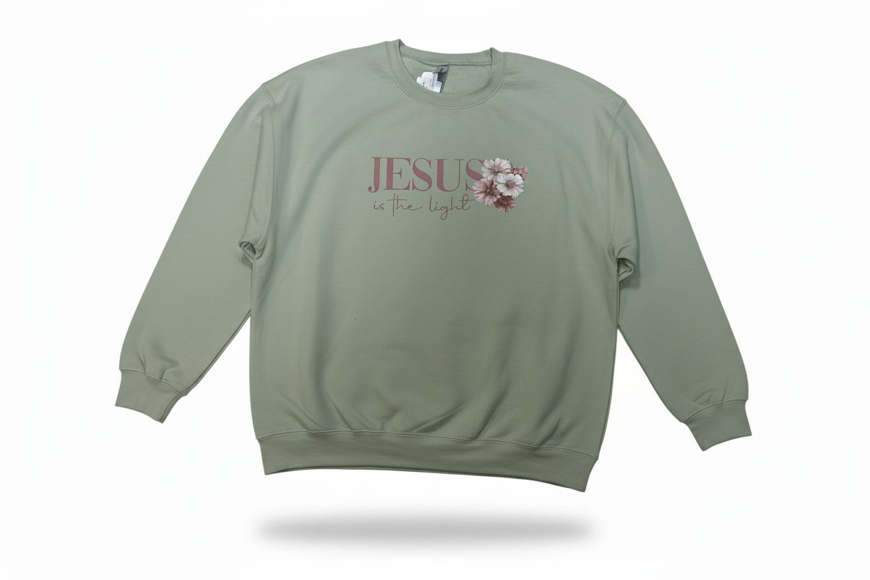 Beige sweatshirt with 'Jesus is the light' text and floral design on a white background, faith-based clothing, Godly wear, faith-based clothing line 